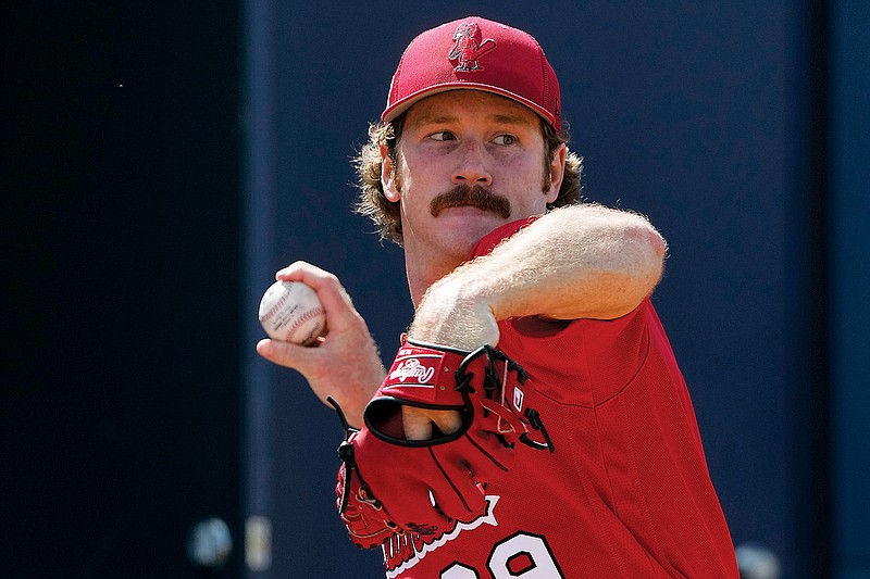 Cardinals pitcher Miles Mikolas throws during spring training last month in Jupiter, Fla. (Associated Press)