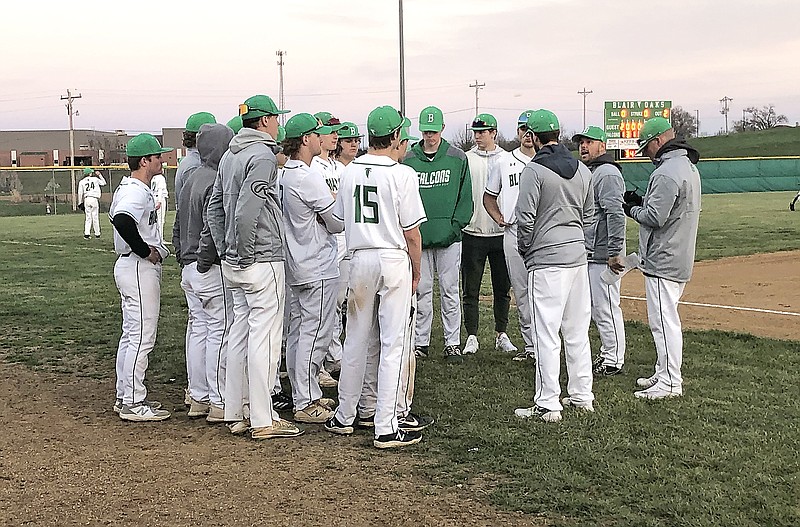 The Blair Oaks Falcons gather together after winning Wednesday's game 8-2 against the Camdenton Lakers at the Falcon Athletic Complex in Wardsville. (Trevor Hahn/News Tribune)