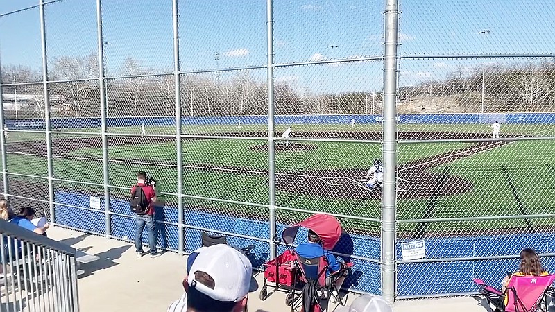 The Capital City Cavaliers warm up just before the first pitch of Monday's game against Hickman at Capital City High School. (Kyle McAreavy/News Tribune)