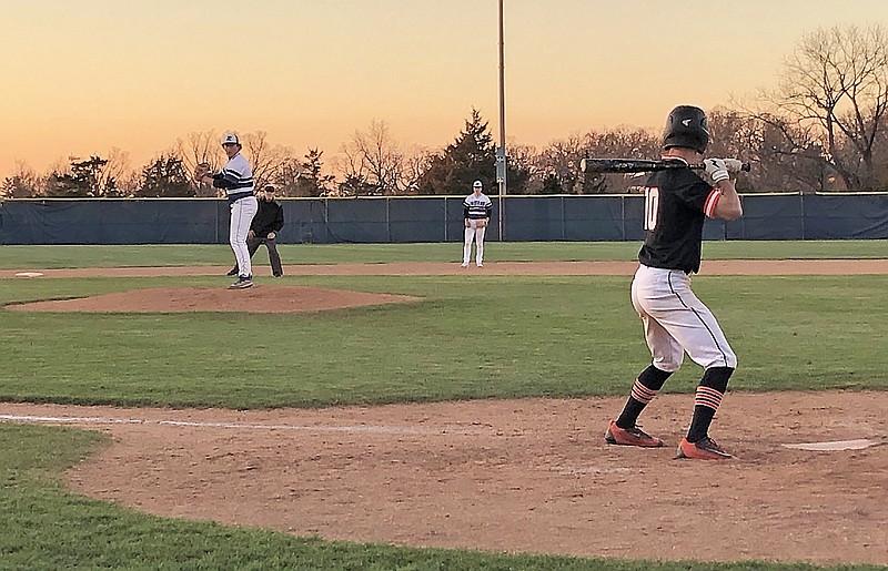 Russellville's Luke Oligschlaeger pitches to Kirksville’s Drew Chrisman during the fourth inning of Friday night’s pool-play game of the Jays Baseball Classic at the American Legion Post 5 Sports Complex.