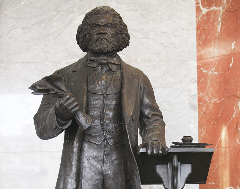 File photo/Ozier Muhammad/The New York Times / A stature of abolitionist Frederick Douglass that is exhibited on Capitol Hill in Washington is shown on Sept. 13, 2012.