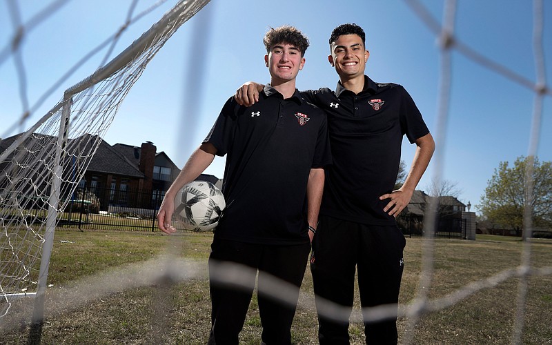 Rockwall Heath High School twins Rafael, left, and Lucas Ponzetto escaped an abusive family in Brazil and were adopted by their aunt and uncle, Rose and Andre Della Monica. After graduation, the two plan to attend Texas A&M University-Texarkana. They are pictured in the backyard on March 19, 2023, in Rockwall, Texas. (Photo by Tom Fox/Dallas Morning News via TNS)