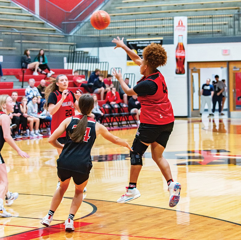 The Jefferson City Lady Jays and the Tipton Lady Cardinals face each other during a scrimmage in Thursday night’s Jamboree at Fleming Fieldhouse. (Ken Barnes/News Tribune)