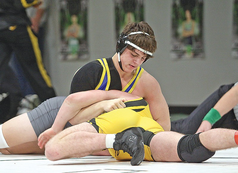 Fatima’s Conner Willis tries to flip Sullivan’s Kane Strehl onto his back for a pin during their 175-pound match in Saturday’s Blair Oaks Duals at Blair Oaks High School in Wardsville. (Greg Jackson/News Tribune)