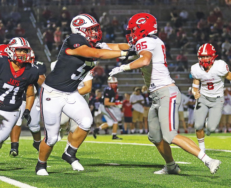 In this Aug. 27, 2021, file photo, Jefferson City offensive lineman Brody Smith blocks Chaminade defensive lineman Ryan Doehring during a game at Adkins Stadium. (News Tribune file photo)