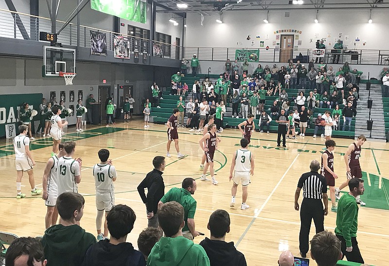 Brock Buhr of Blair Oaks (back right) holds the ball as the final second counts down in Friday night's game against School of the Osage at Blair Oaks High School in Wardsville. (Greg Jackson/News Tribune)