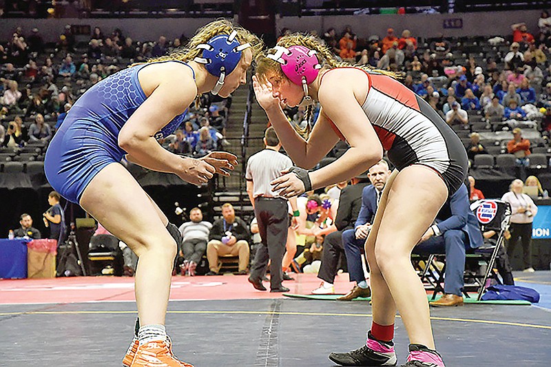 Jefferson City junior Lexi Dunwidde matches up against Washington’s Annelise Obermark during their semifinal match at 140 pounds Saturday in the Class 2 girls wrestling state championships at Mizzou Arena in Columbia. (Cleo Norman/News Tribune)