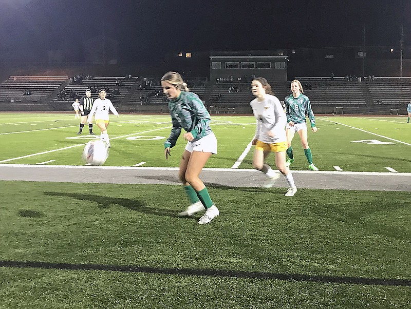 Hattie Meldrum of Blair Oaks attempts to control the ball along the sideline during Friday night's game against Fulton in the Blair Oaks Shootout at the Falcon Athletic Complex in Wardsville. (Greg Jackson/News Tribune)