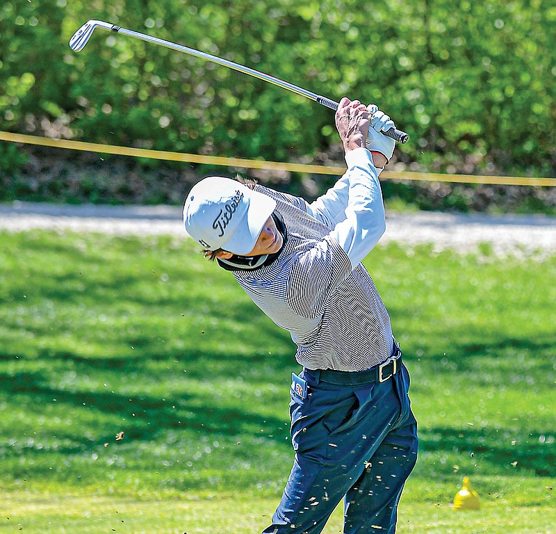 Archer Schnieders of Helias tees off from the 10th hole during last year’s Helias Invitational at Jefferson City Country Club. (Julie Smith/News Tribune)