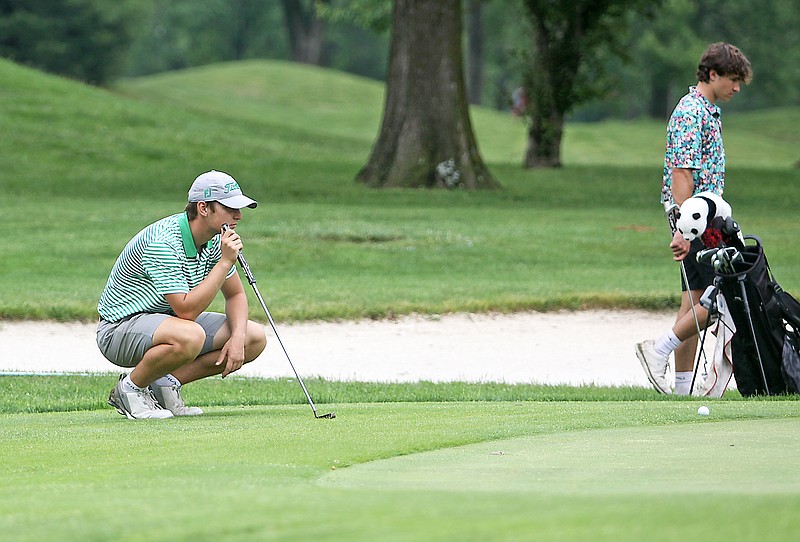 Sam Kliethermes of Blair Oaks lines up a putt on the 18th green during last year's Class 3 boys golf state championships at Meadow Lake Acres Country Club in New Bloomfield. (Greg Jackson/News Tribune)