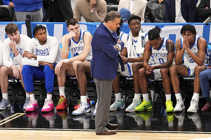 Kentucky coach John Calipari stands in front of the bench late in the second half of Thursday night's first-round game of the men's NCAA Tournament against Oakland in Pittsburgh. (Associated Press)
