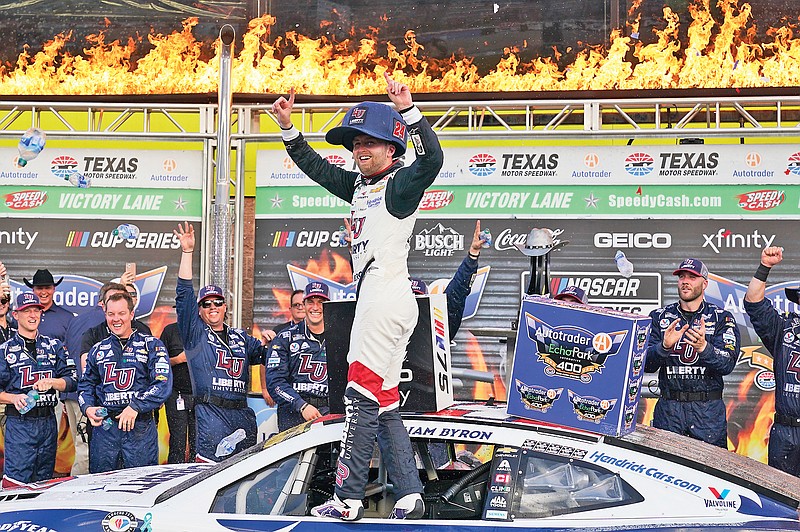 In this Sept. 24, 2023, file photo, William Byron celebrates winning the NASCAR Cup Series race at Texas Motor Speedway in Fort Worth, Texas. (Associated Press)