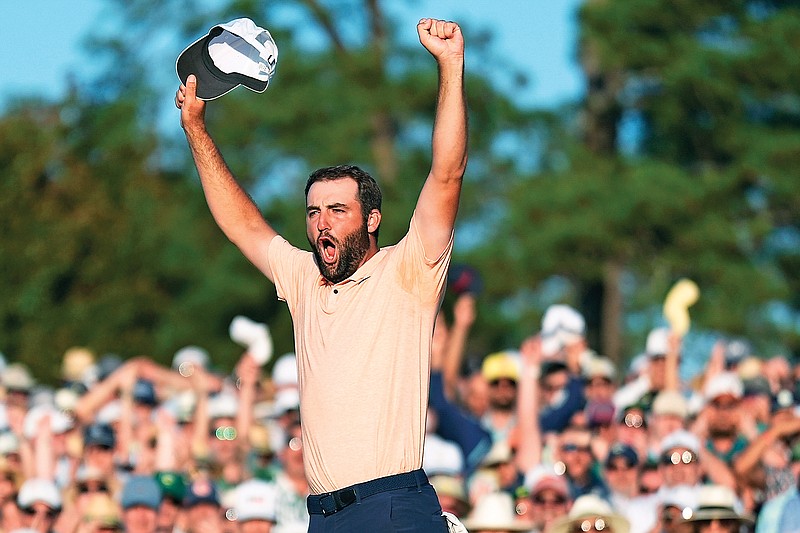 Scottie Scheffler celebrates his second Masters win in three years Sunday on the 18th hole at Augusta National Golf Club in Augusta, Ga. (Associated Press)
