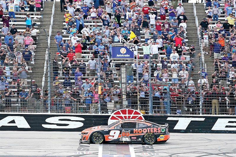 Chase Elliott crosses the finish line to win Sunday’s NASCAR Cup Series race at Texas Motor Speedway in Fort Worth, Texas. (Associated Press)