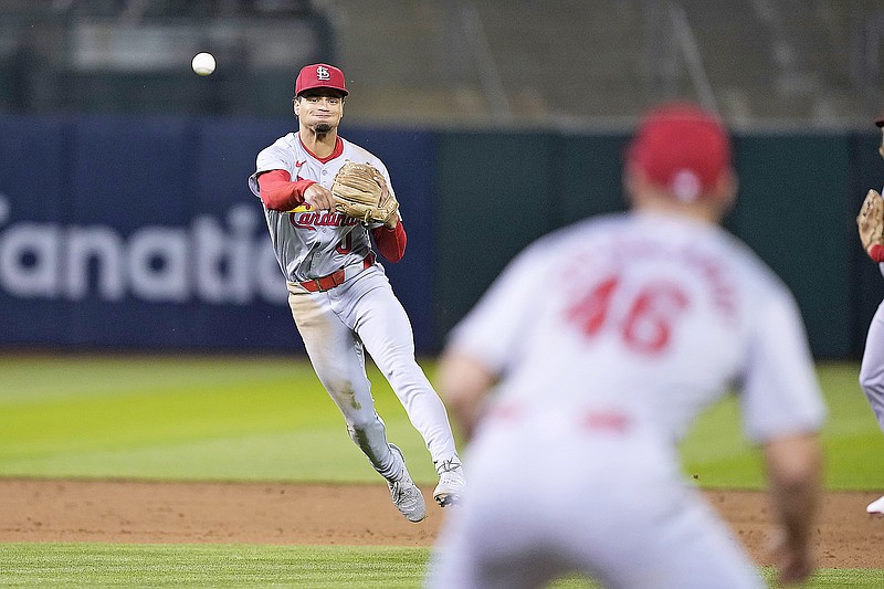 Cardinals shortstop Masyn Winn throws the ball to first base for an out during the fifth inning of Tuesday night's game against the Athletics in Oakland, Calif. (Associated Press)