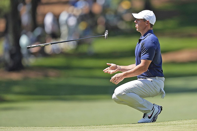Rory McIlroy reacts after missing a putt on the seventh hole during Sunday's final round of the Masters at Augusta National Golf Club in Augusta, Ga. (Associated Press)