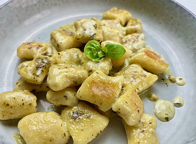 Cottage Cheese Gnudi With Brown Butter and Pesto Cream
