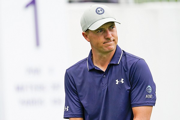 Spieth keeps clean card in mud for 63 to lead PGA Tour playoff opener