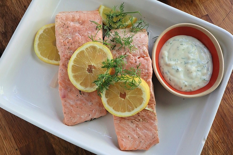 Poached salmon and broccoli Caesar salad make a healthy, hearty meal