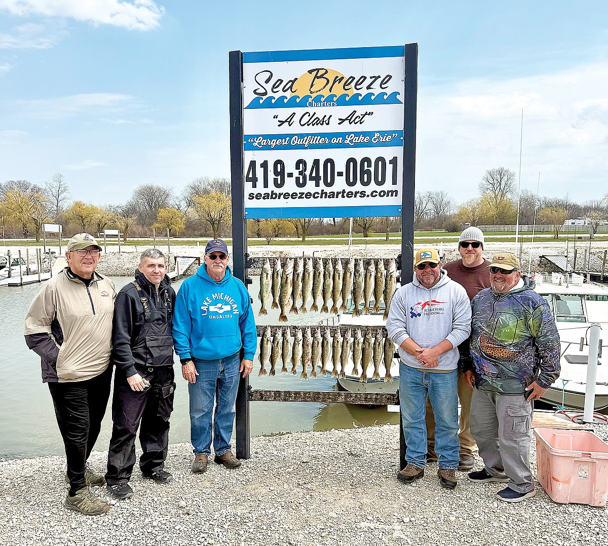 Driftwood Outdoors: Fishing Lake Erie Western Basin walleye on boat full of friends