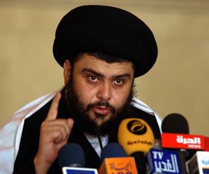 Shiite cleric Muqtada al-Sadr, delivers a Friday sermo, in a mosque, in Kufa, Iraq, in this 2006 file photo. 