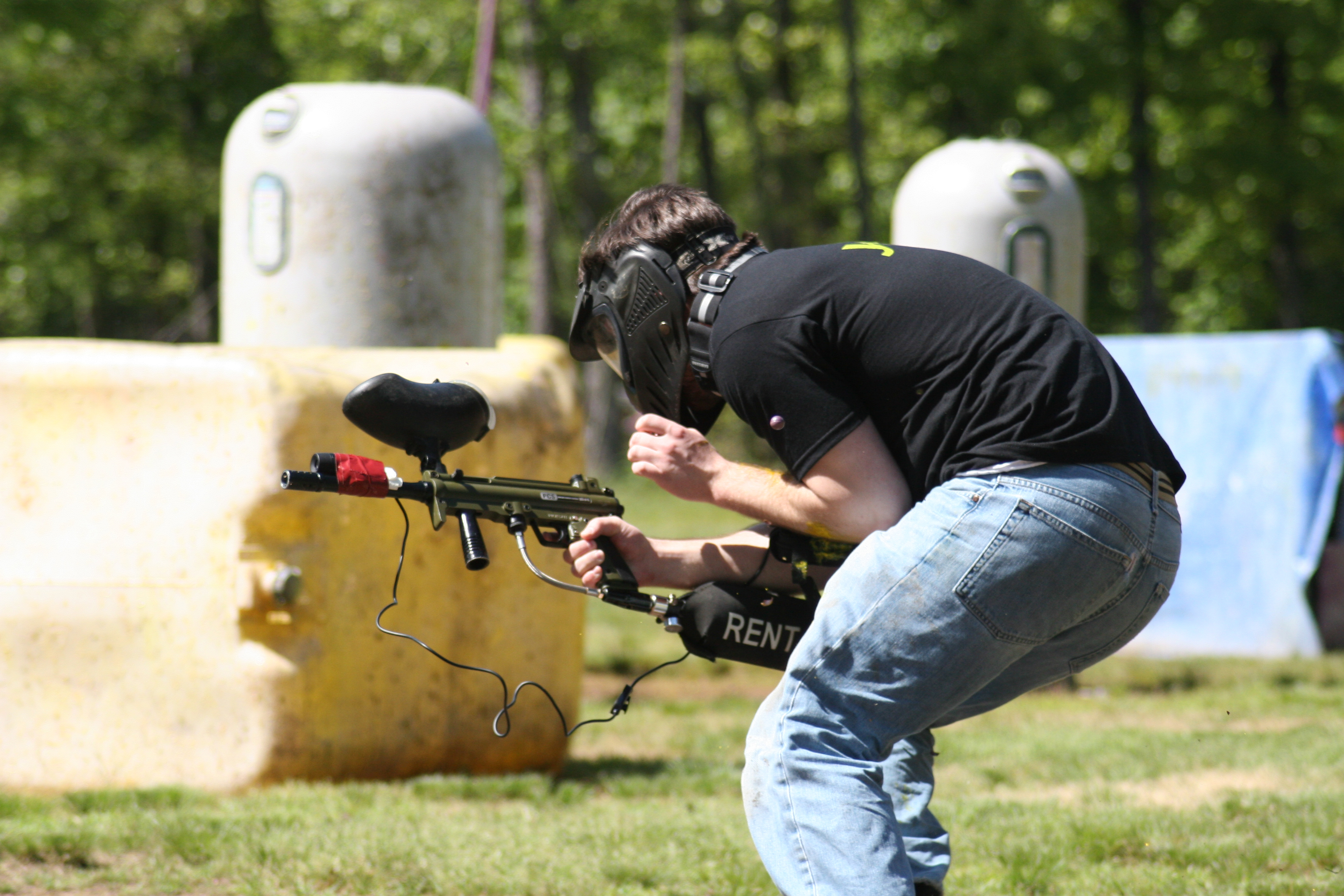 If you look closely, you can see the paintball floating midair before breaking on Nick.