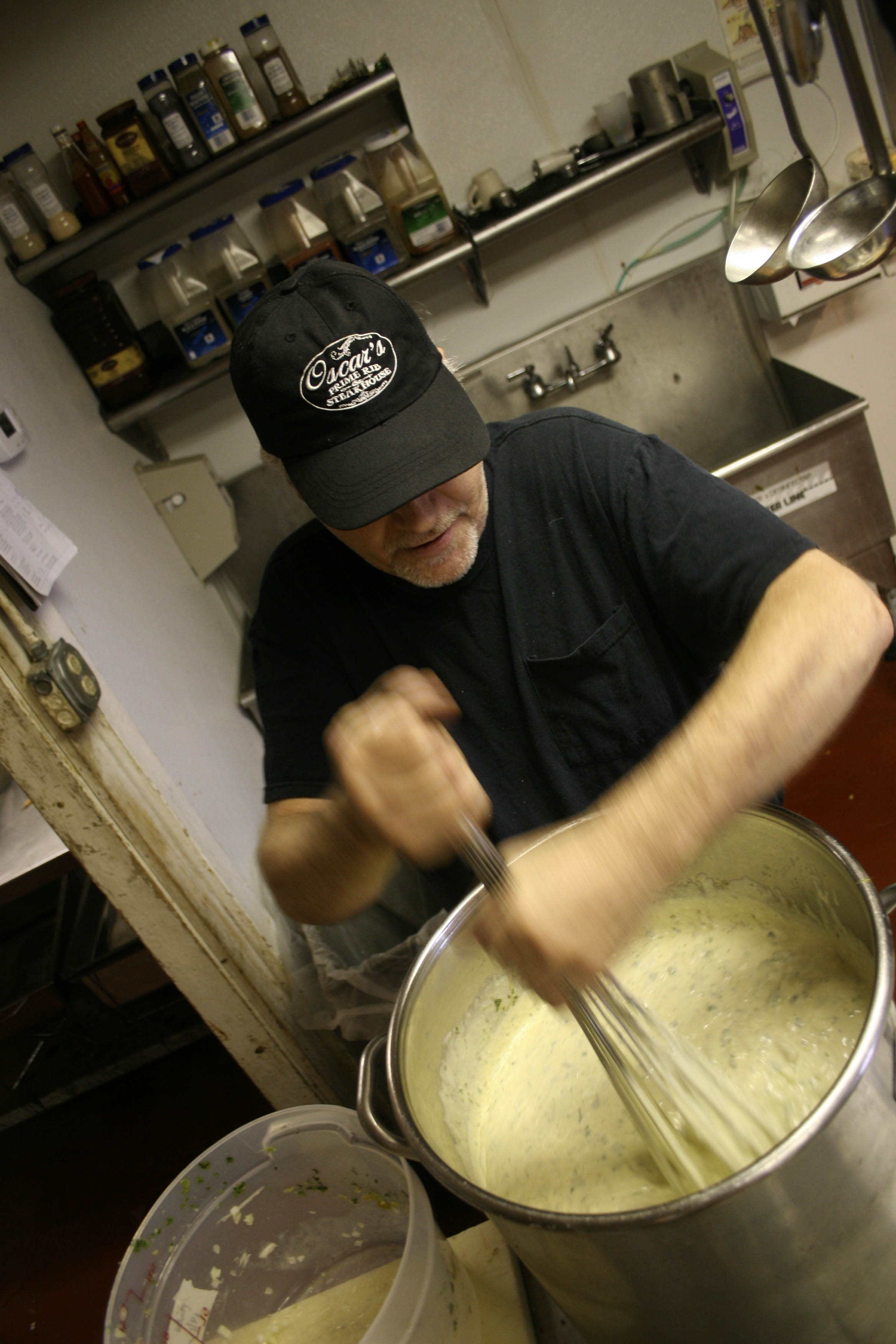 There are three different cheeses and four different peppers. They make twelve gallons a day, four days a week.
