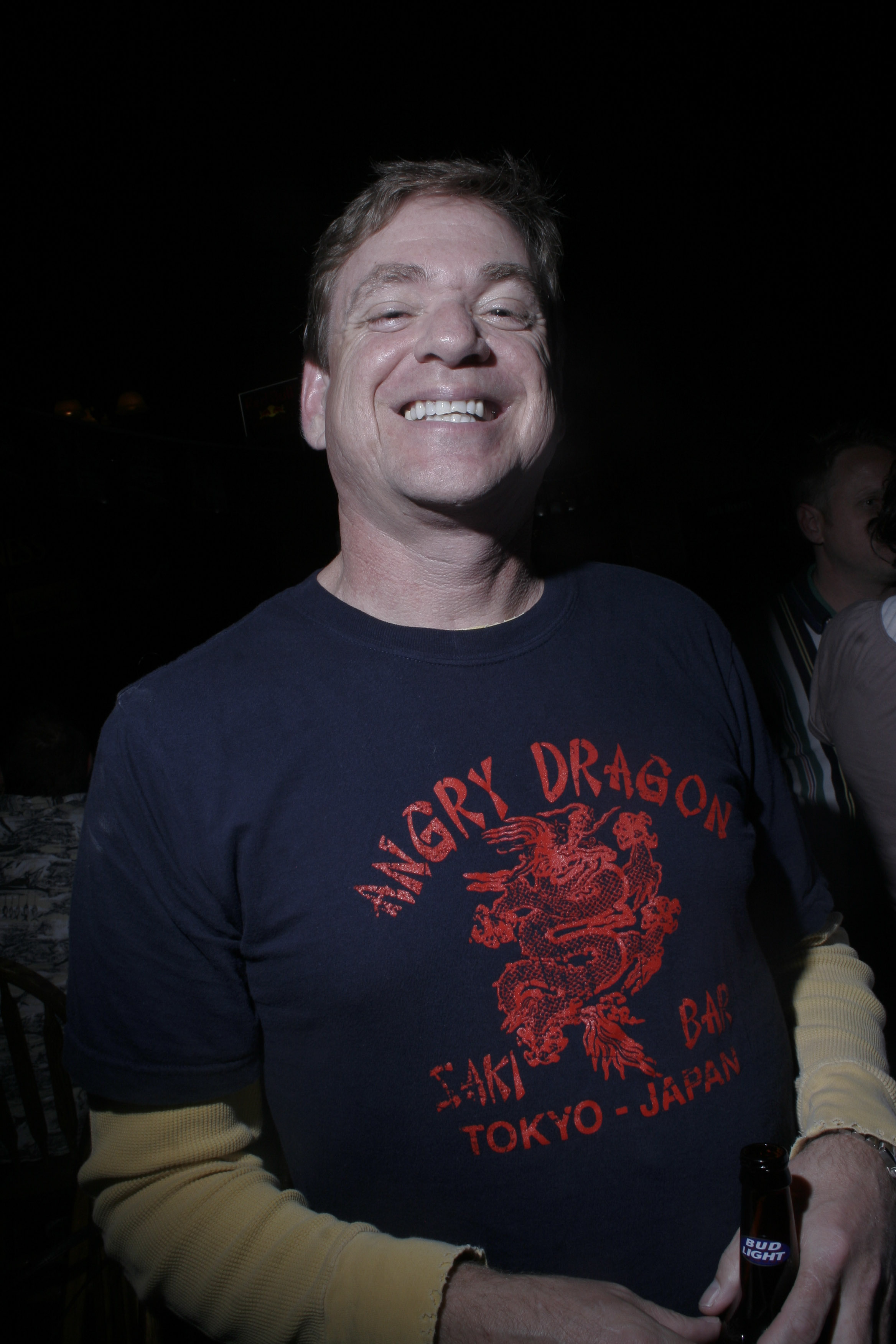Tony D., vocalist for the Little Rock-based band jet420 enjoys drinks and music before his band took the stage at Cornerstone Pub in North Little Rock Thursday during a show benefitting Special Olympics.