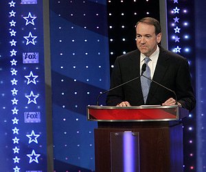 Republican presidential hopeful former Arkansas Gov. Mike Huckabee is seen during the Republican debate at University of South Carolina's Koger Center for the Arts. The debate was sponsored by the South Carolina Republican Party and Fox News Channel with Brit Hume moderating. 