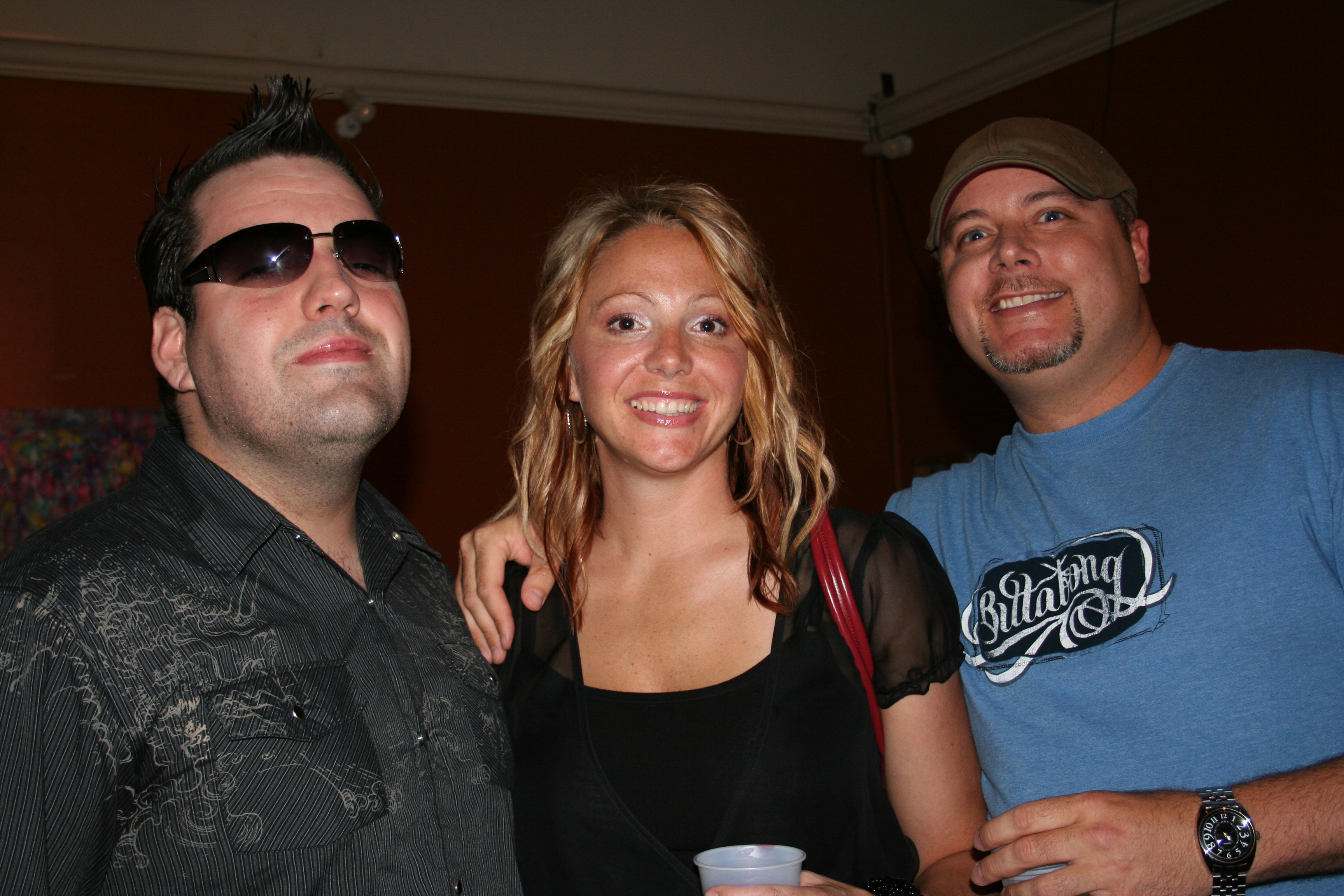 Justin Sane, Heather Minenna and Dave McRoberts enjoy their first visit to the ArtsScene Art Party