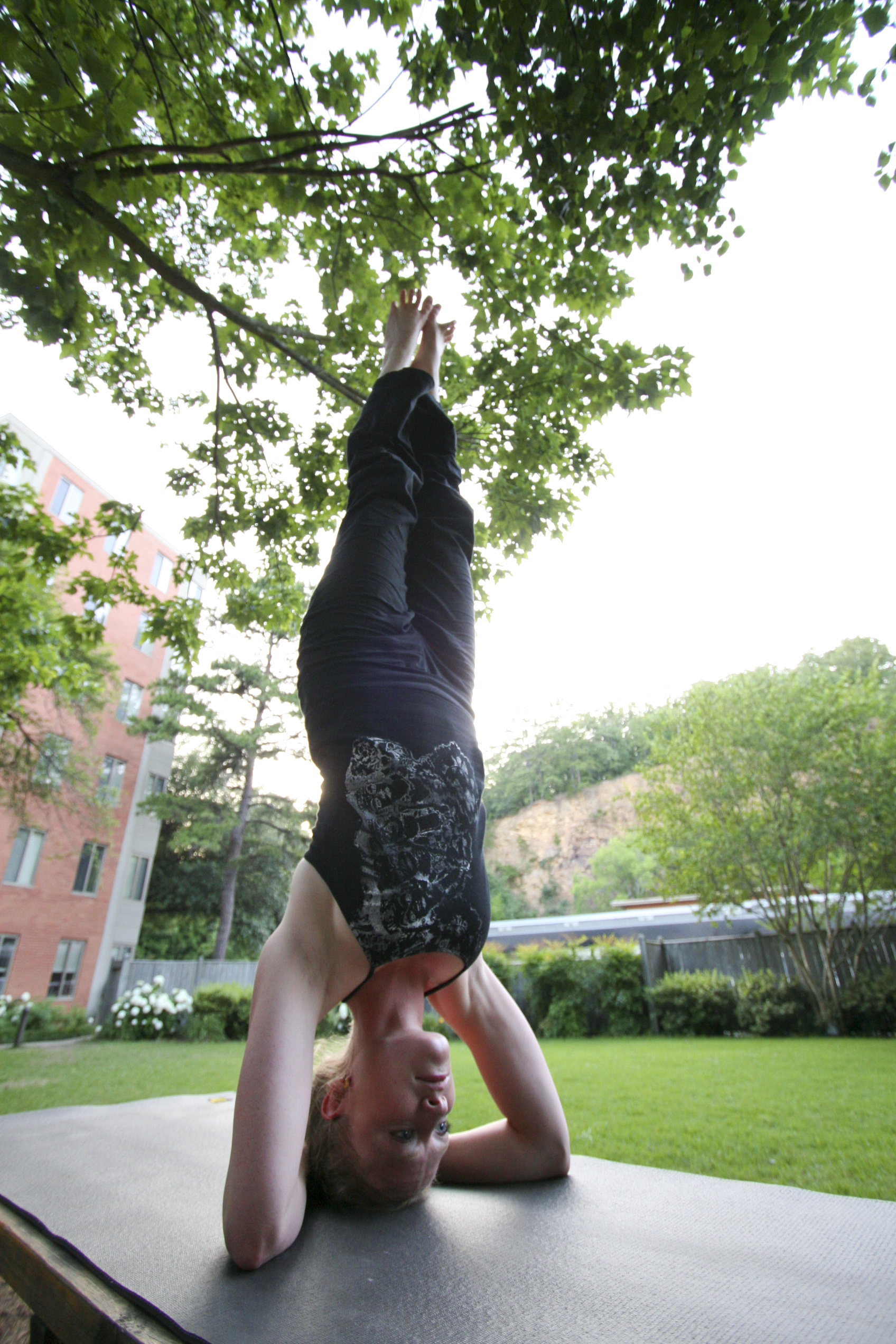 Erin Lorenzen demonstrates various yoga poses.