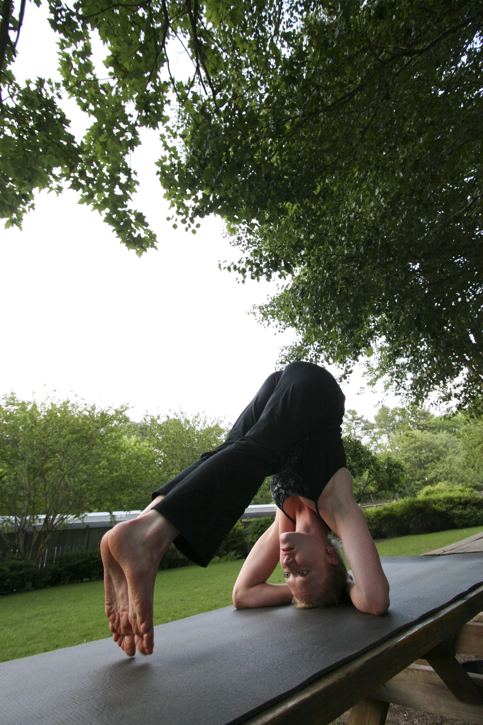 Erin Lorenzen demonstrates various yoga poses.