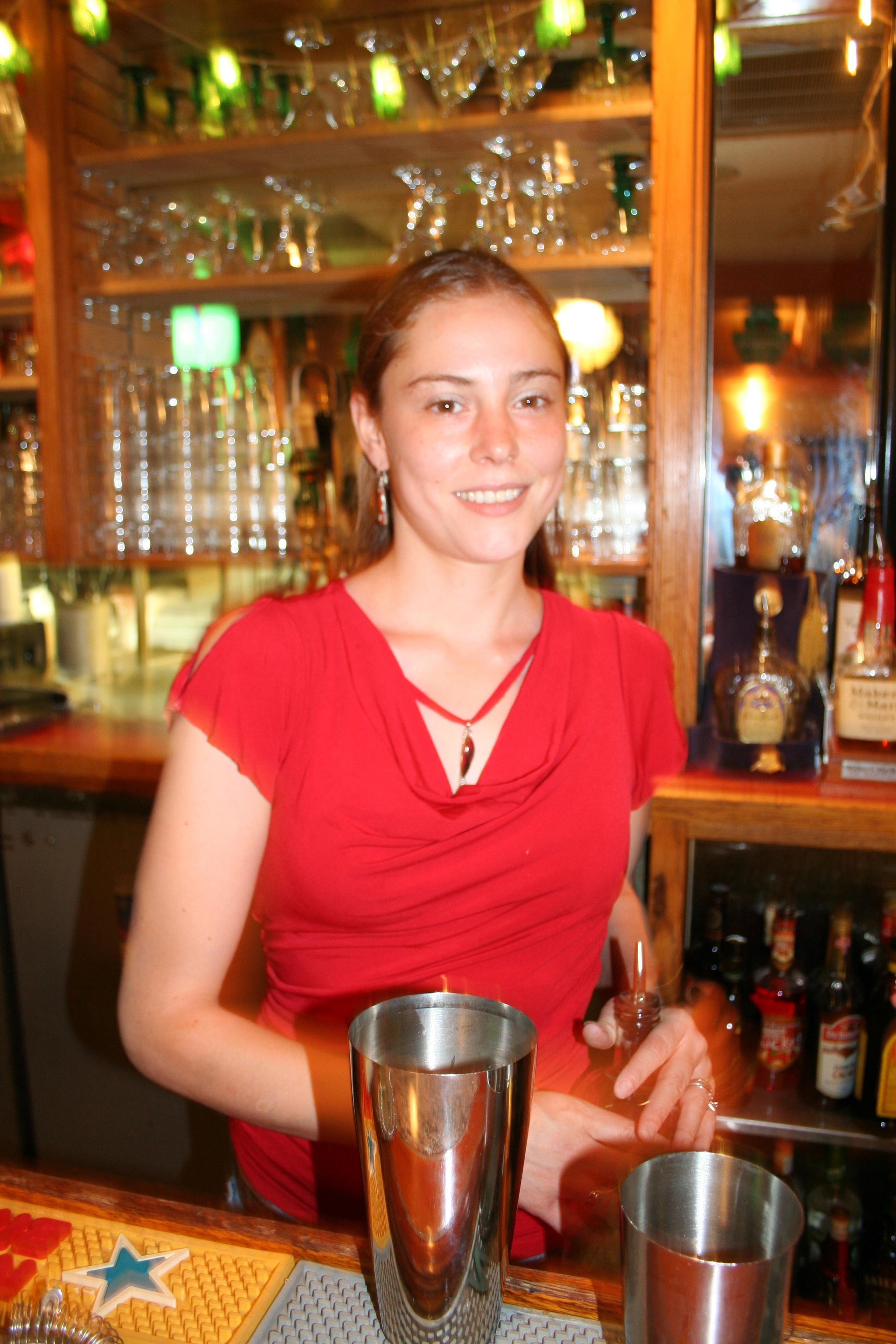 Katrina Harris makes drinks with a smile at Markham on Thursday night.