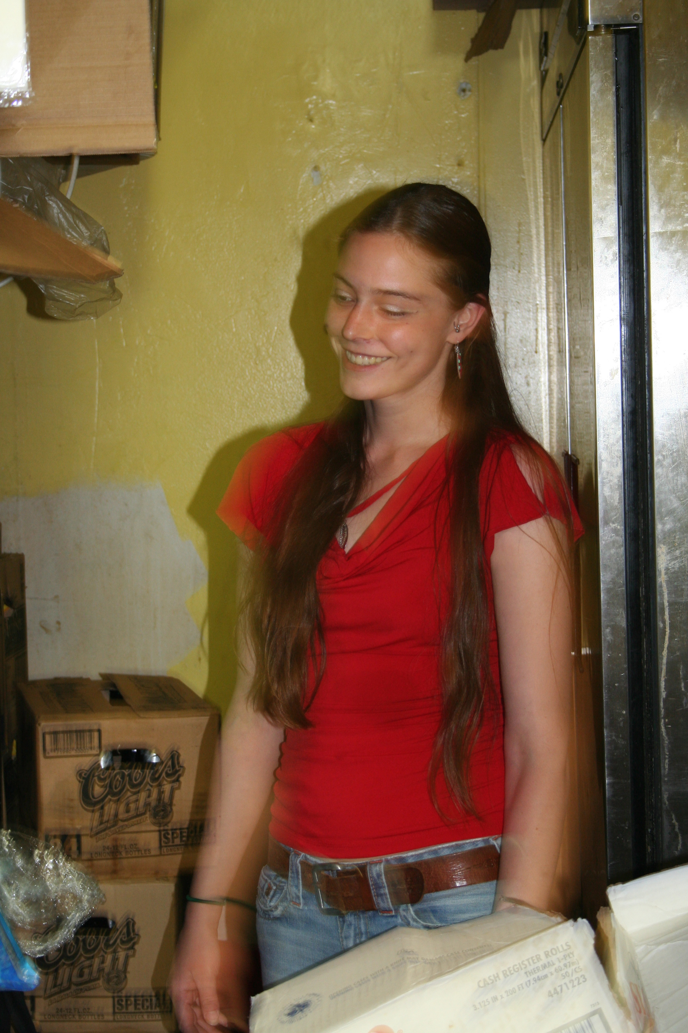 And she smiles even when she's restocking the fridge!