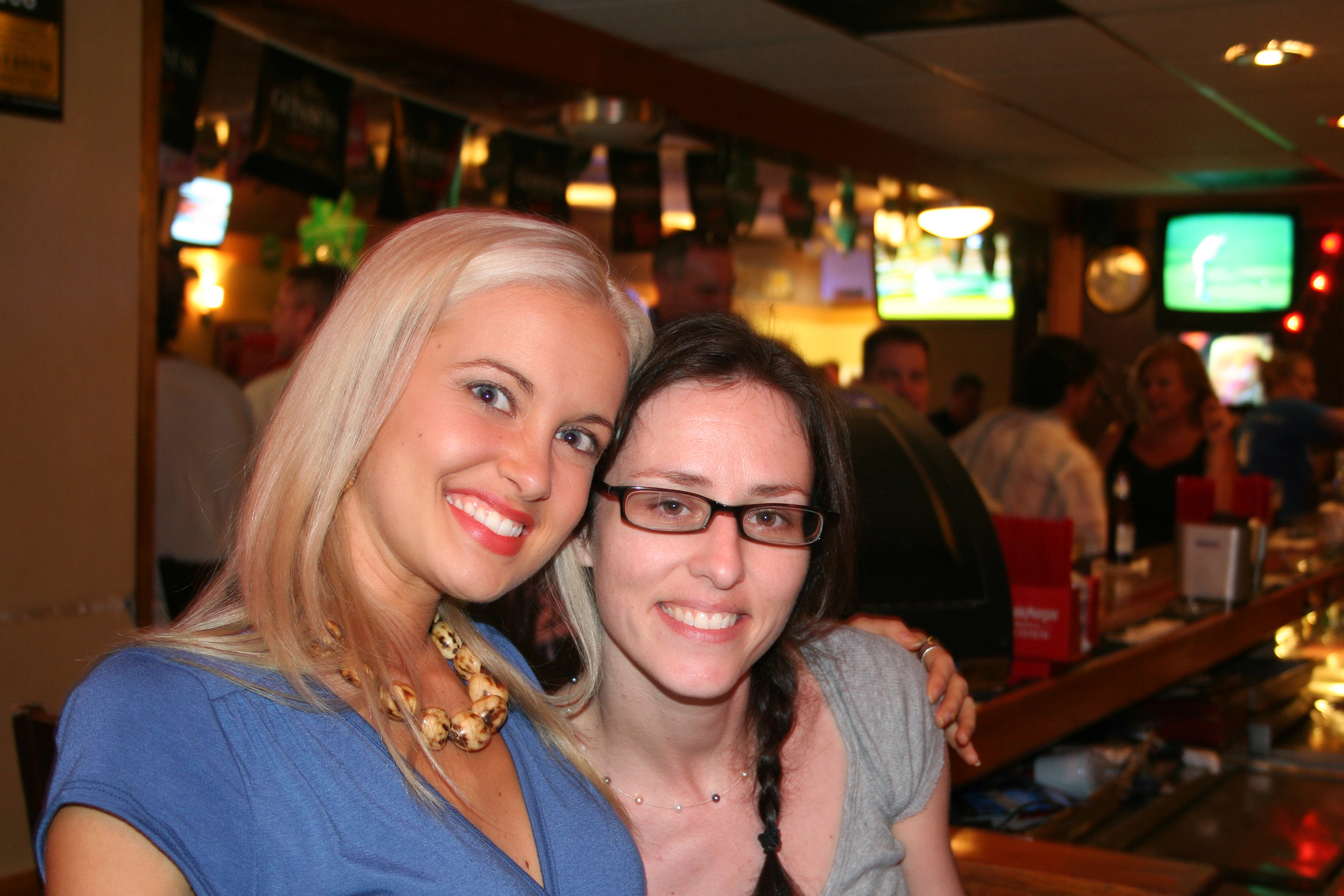 SYNC's Lauren interrupts Meredith Bartley for a picture while working at Markham St. Pub and Grill.