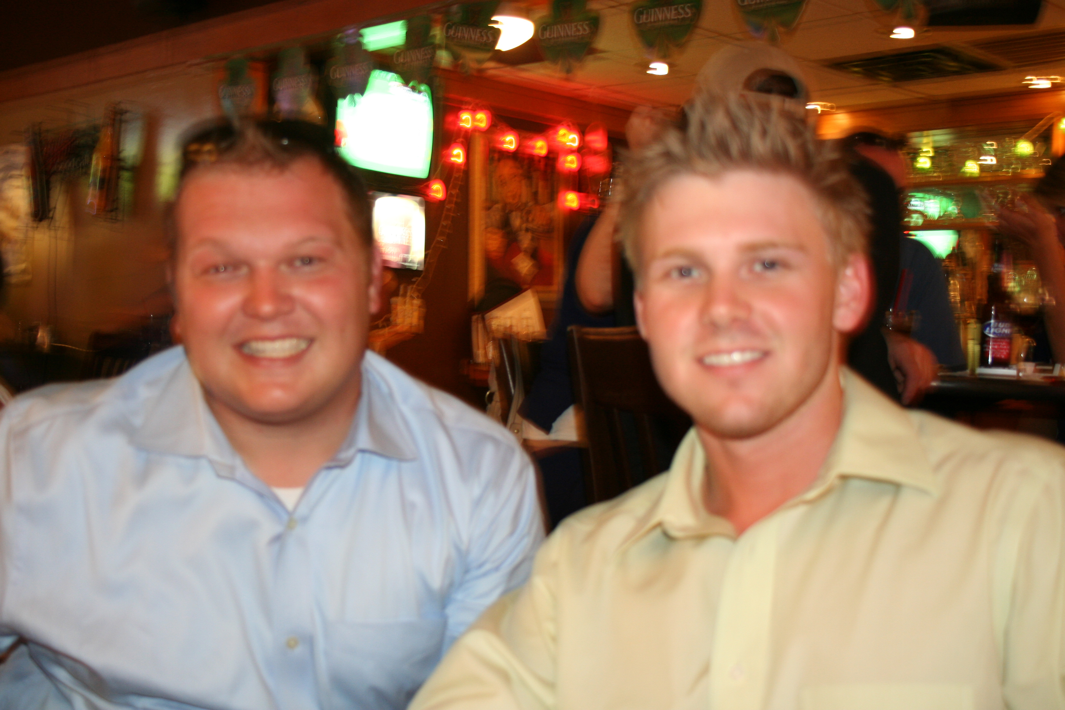 Nathan Stamp and Corey Loftis smile for SYNC.