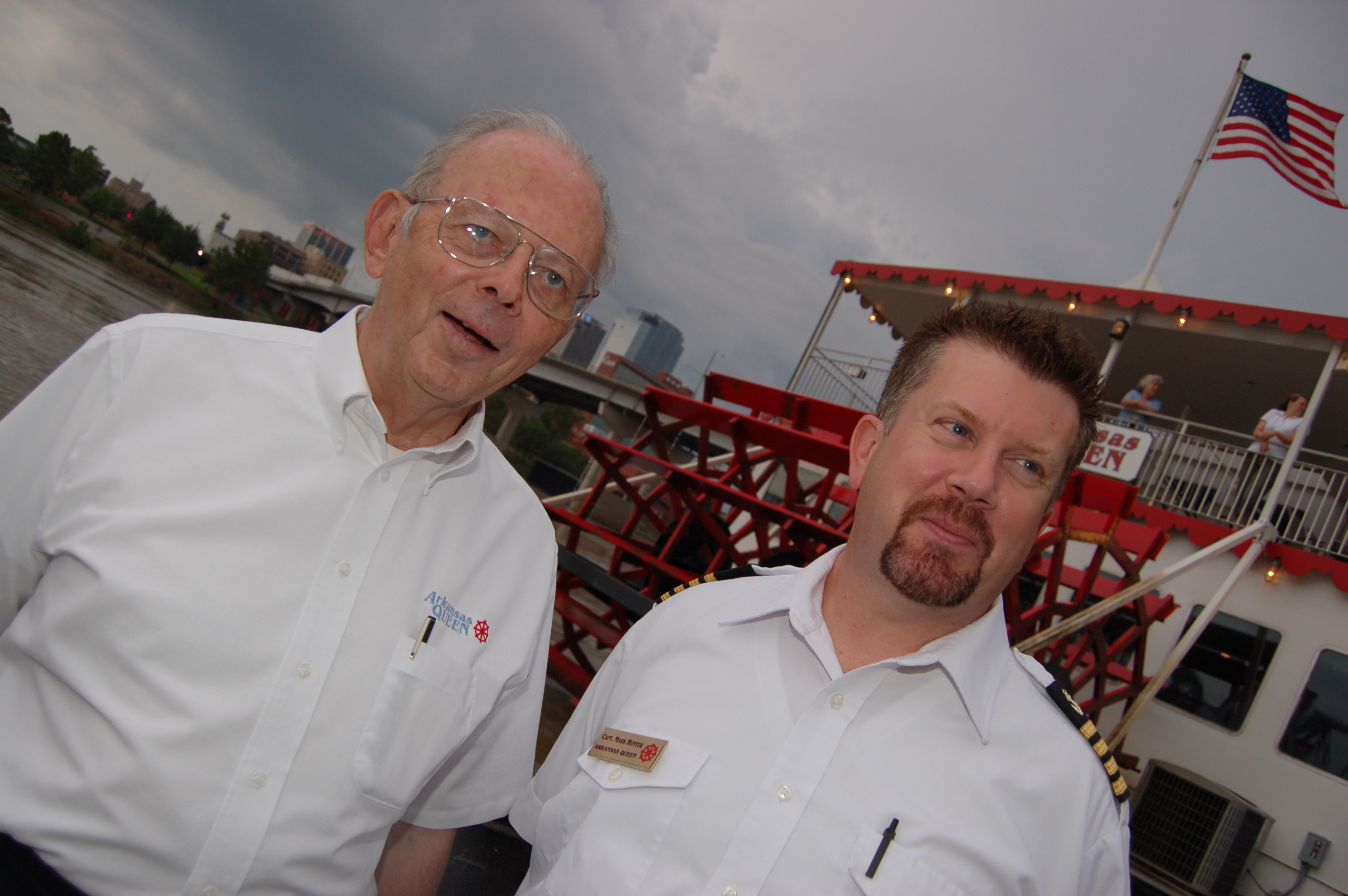 Captains Bob Lumpp and Mark Hunter are in charge of navigating the Arkansas Queen up and down the Arkansas River for dinner cruise guests.