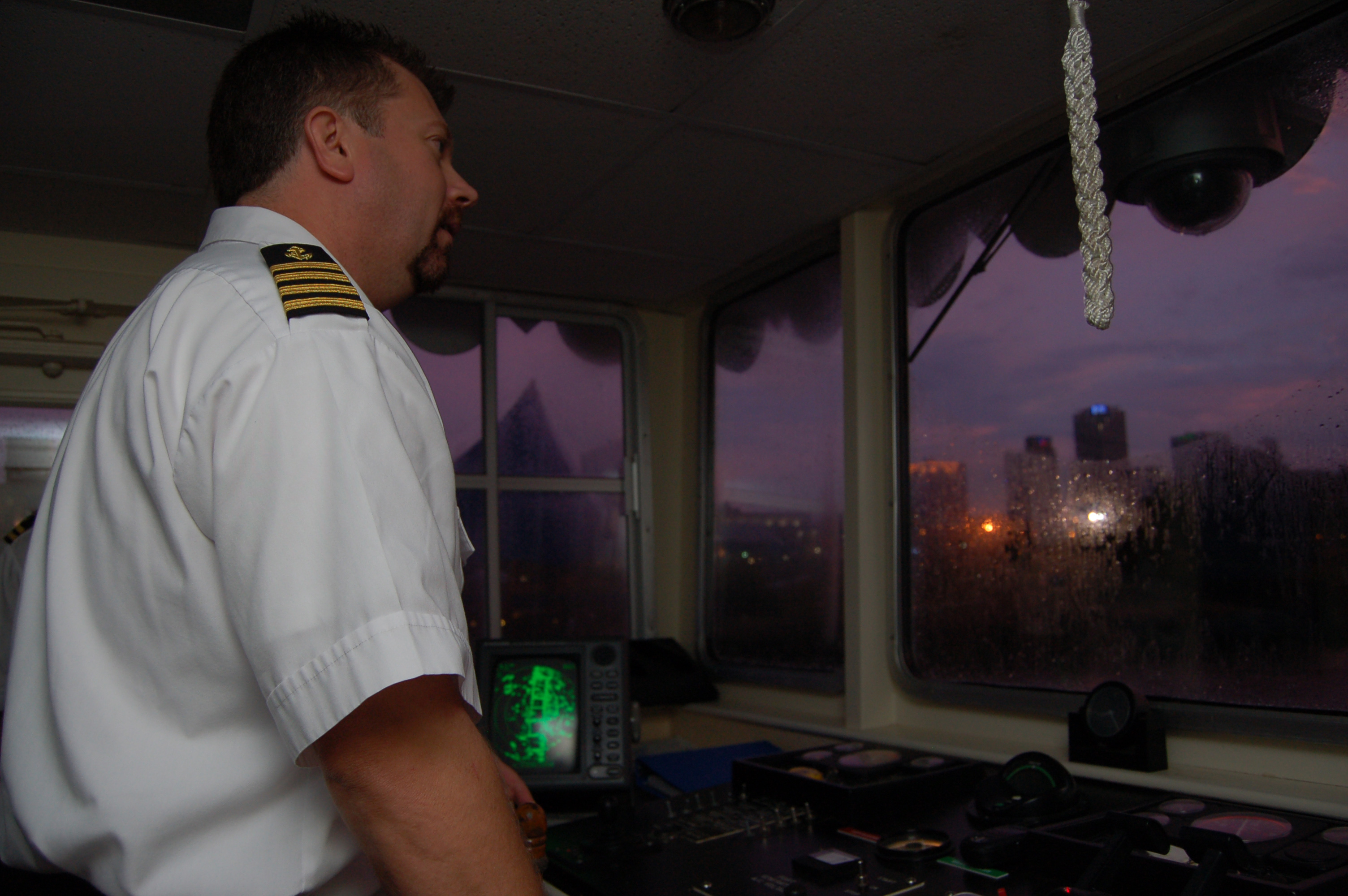 Arkansas Queen Capt. Mark Hunter has a splendid view of the Little Rock skyline.