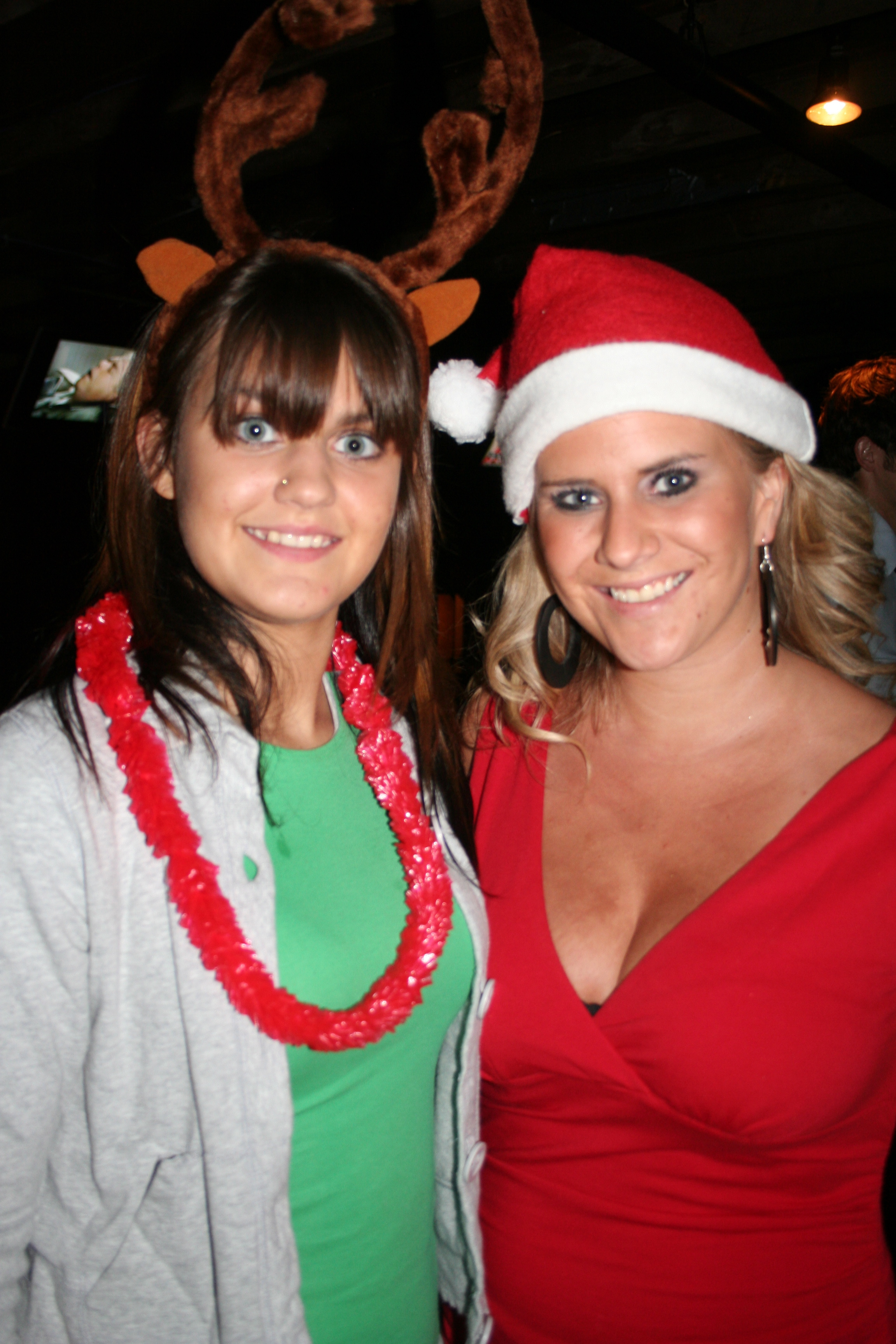 Shayna Bower and Scarlett Richardson, dressed for the party, serve the crowd at DEEP.