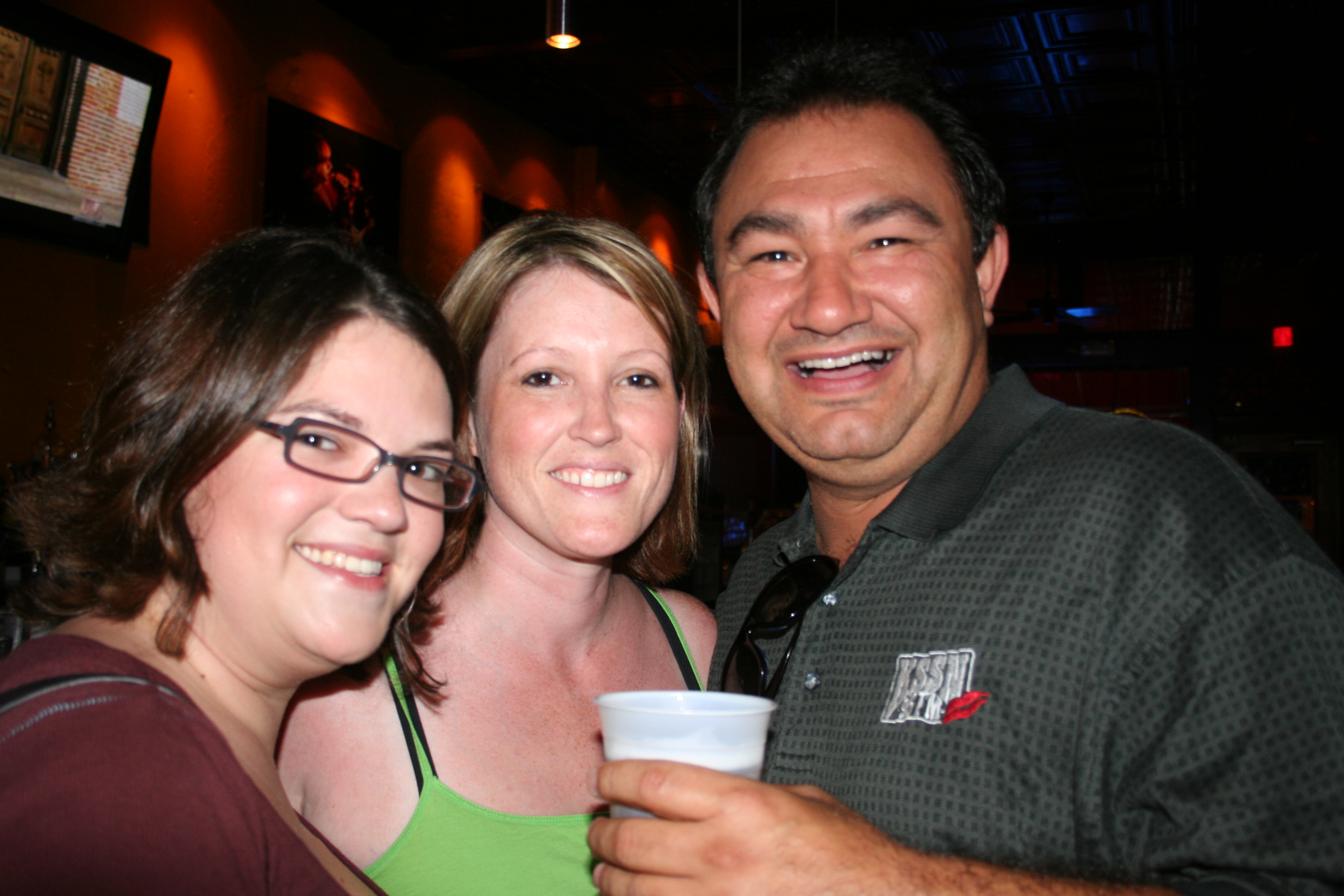 Karen Minnis, Melissa Snyder and Joe Cates make sure the KSSN Country Party goes great.