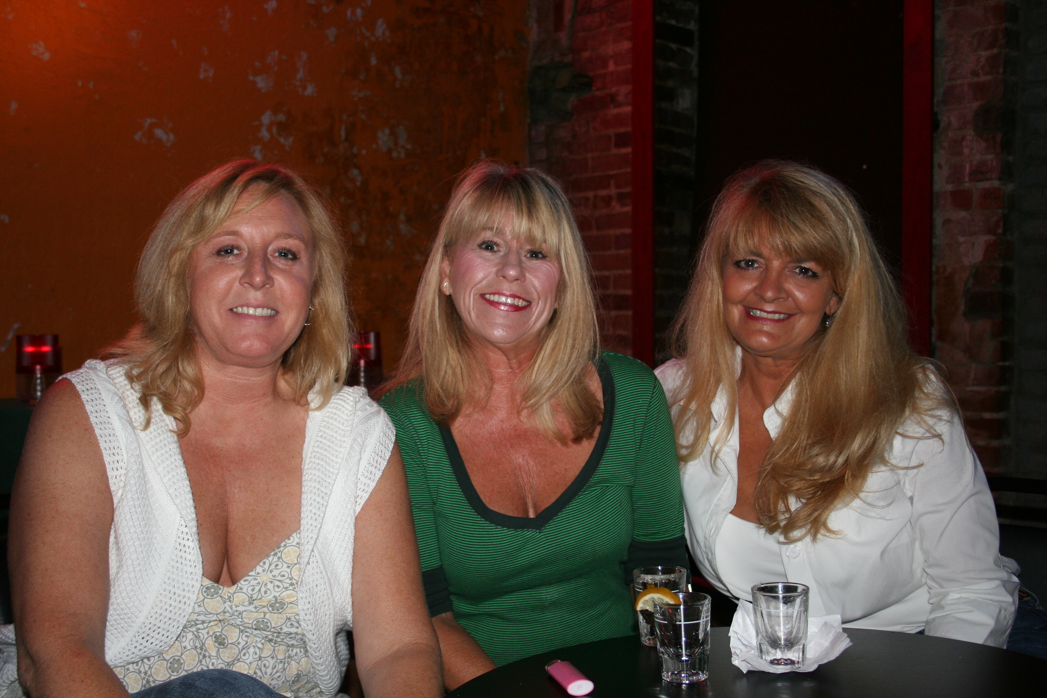 Tammy Warnsing, Sandy Ashabranner and Nicki Knight smile for SYNC.