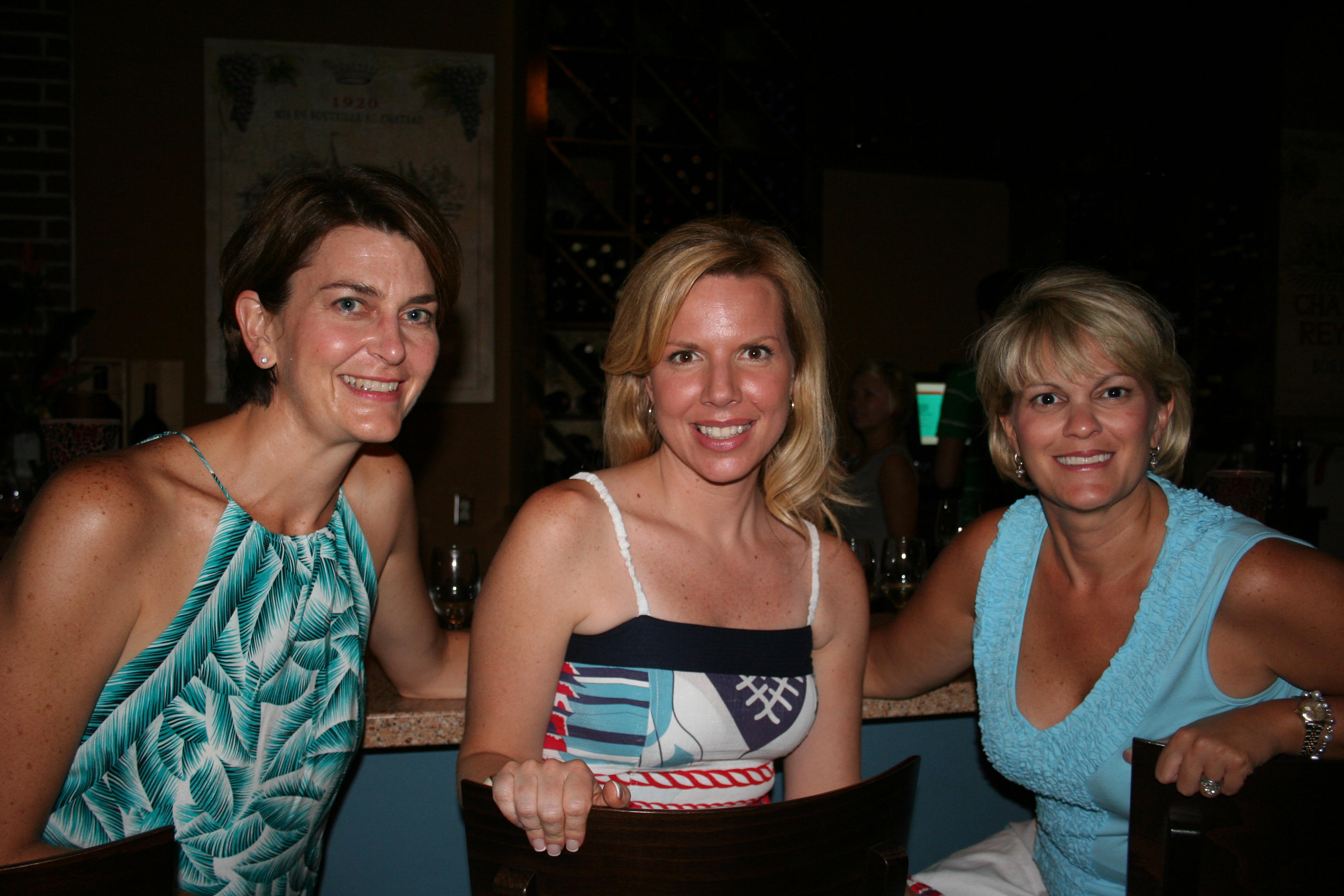 Cindy Hubach, Jill Lawrence and Susie Munson enjoy girl talk at Crush Wine Bar.