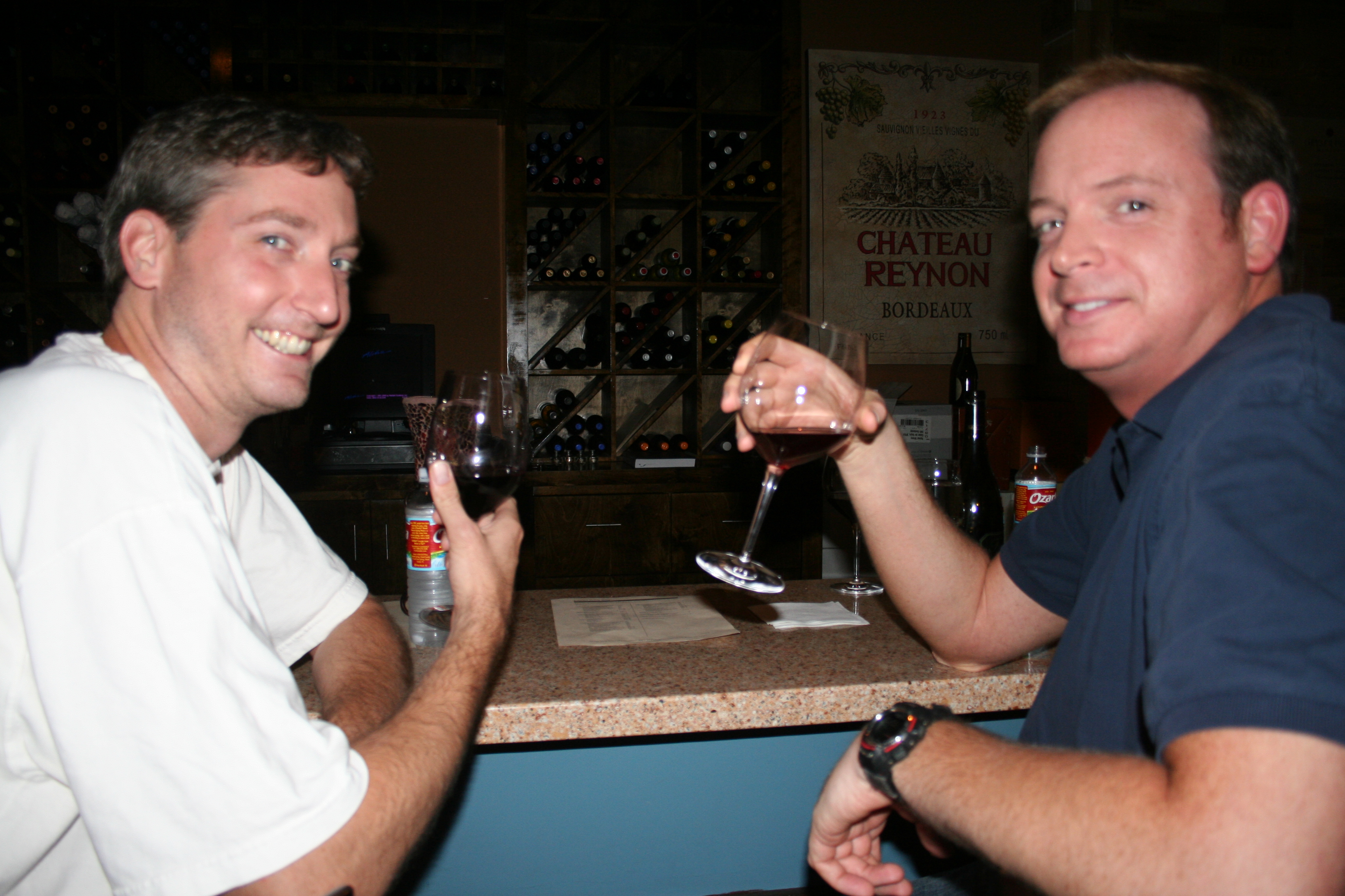 Enjoying the wine...
Stephen Blackwell and Don Overton chat at the bar.