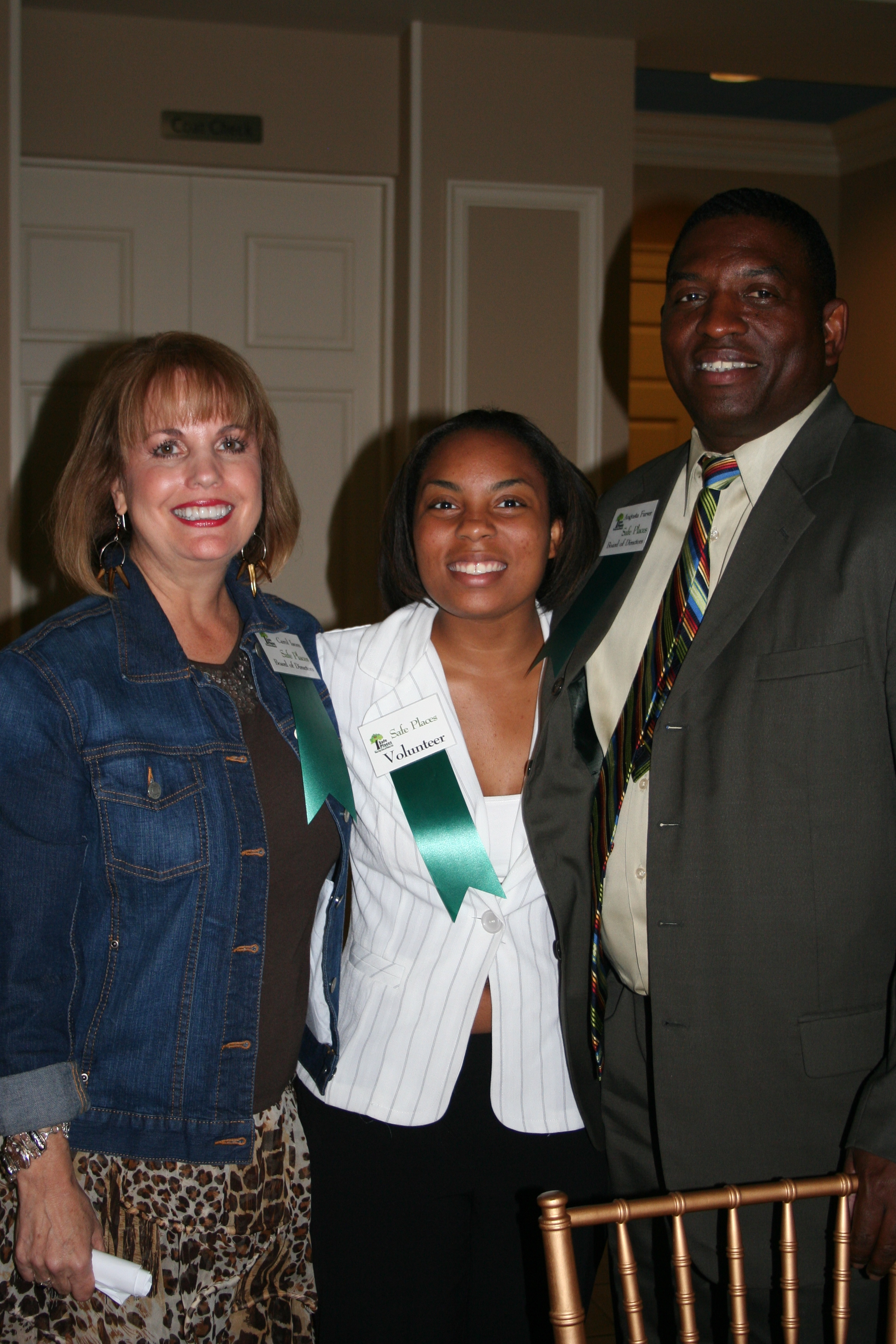 Carol Isom, Chasity Farver and Augusta Farver welcome the guests.