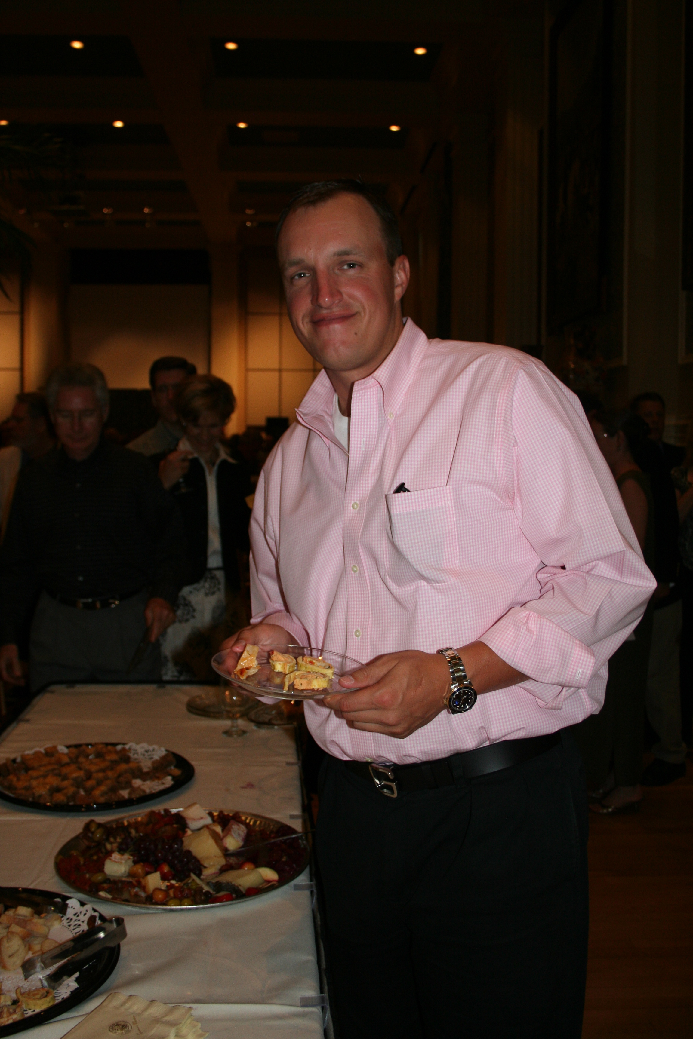 Burke Burnett enjoys the buffet of hors d'oeuvres.