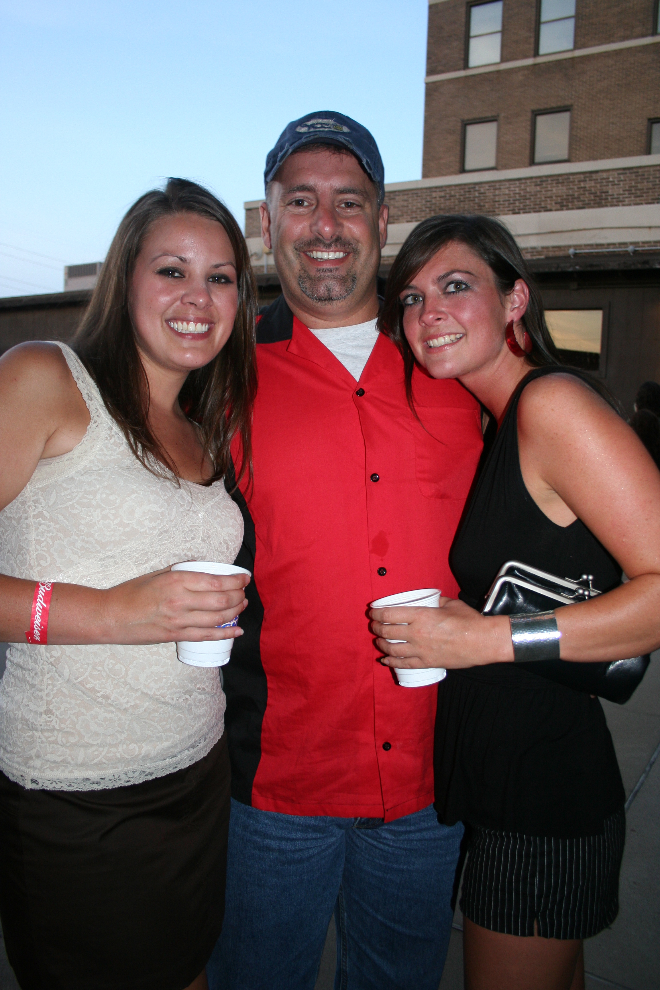 Laura Rasmussen, Mark Pace and Jennifer get ready for a great weekend of kickball!