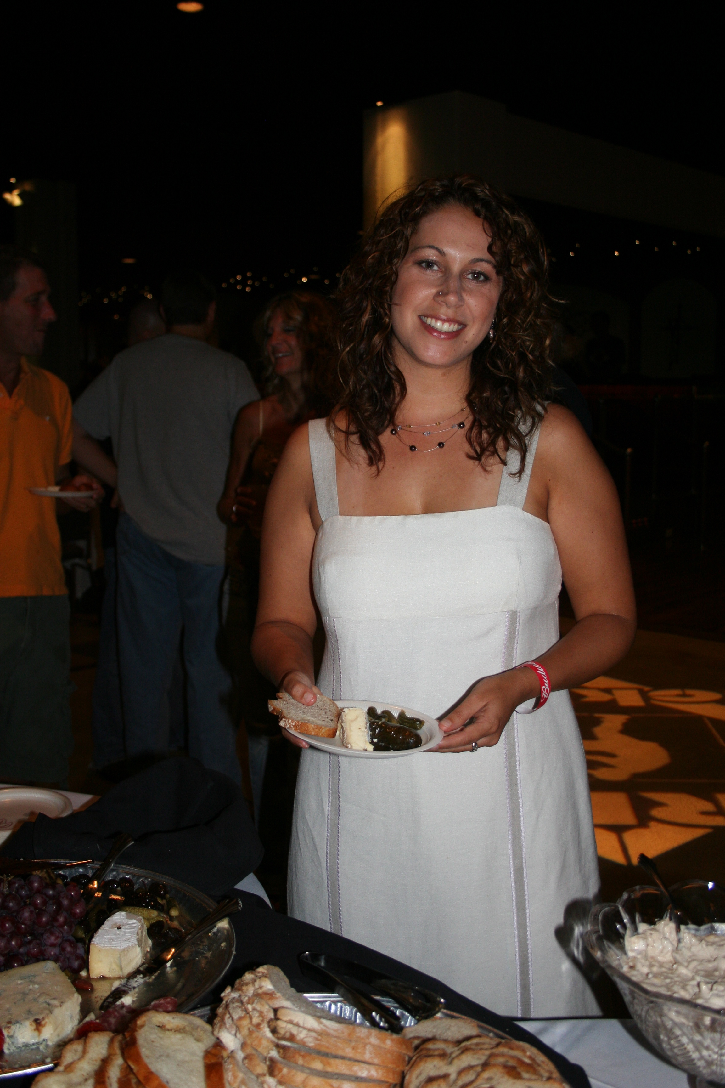 Angela Hunter smiles for SYNC as she visits the snack table.