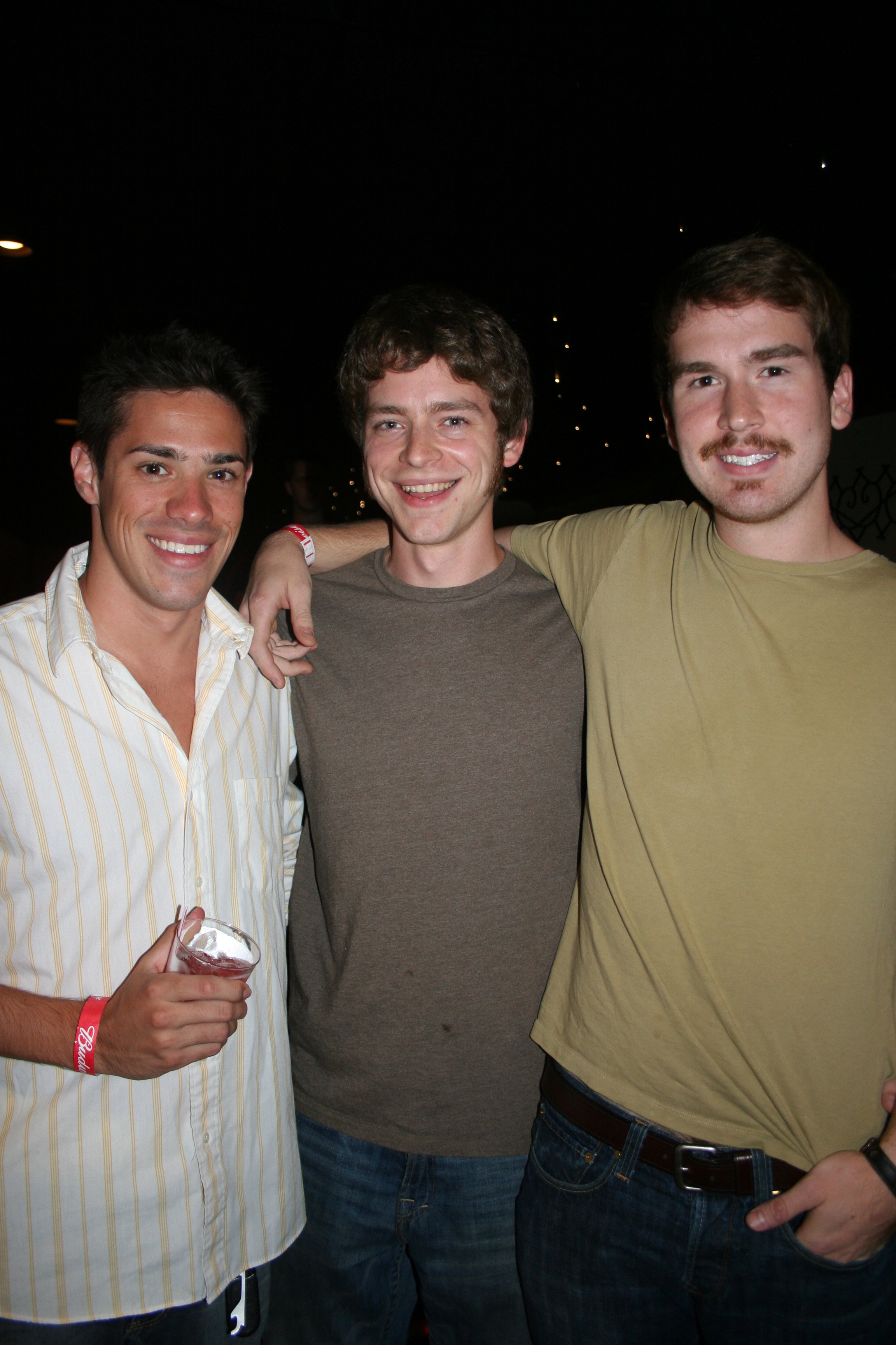Ian Davis, Christian Shadid and Sam Hitt smile for SYNC.