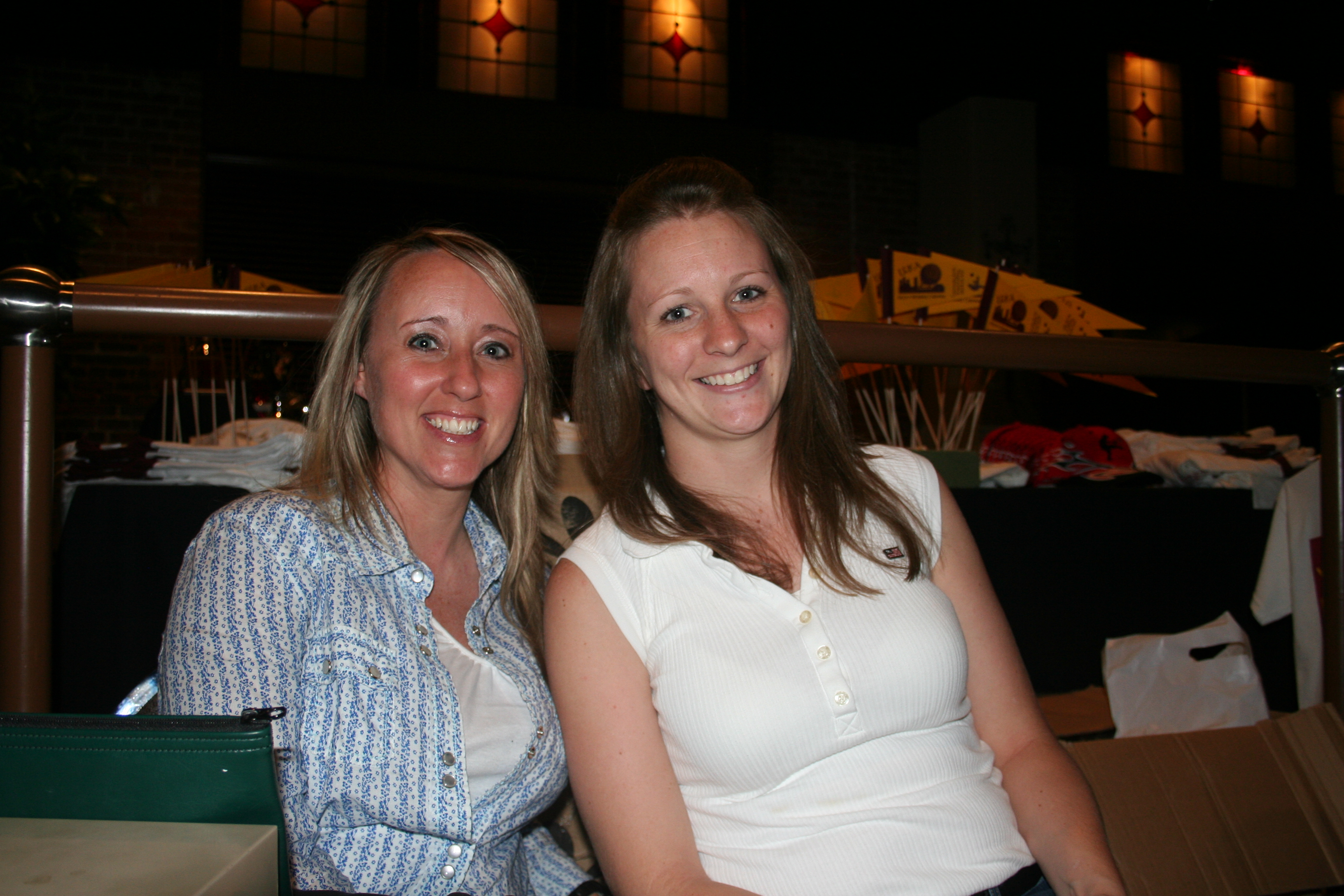 Good job, ladies.
Susan Mosler and Lindsey Williamson greet guests at the door.