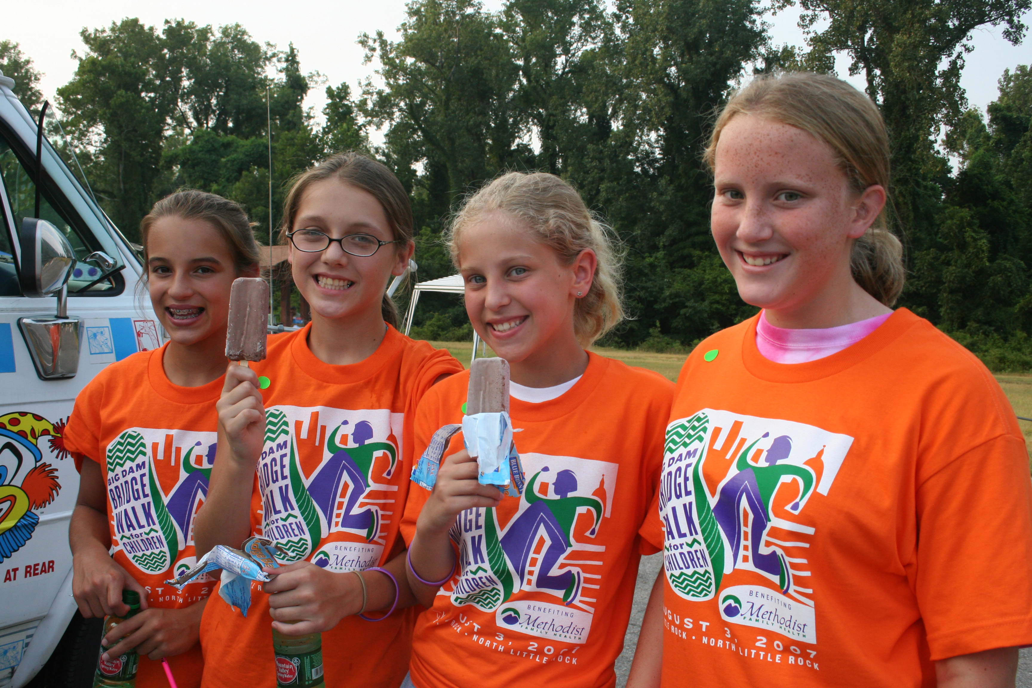 Halley Rush, Ariel Wamm, Emily Barber and Julie Terhune enjoy a cold treat after the walk.